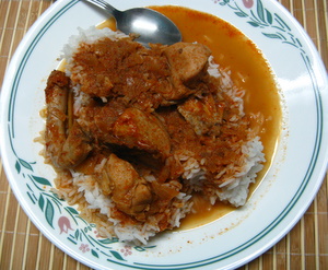 thai red chicken curry with rice on a plate thai red chicken curry with rice on a plate